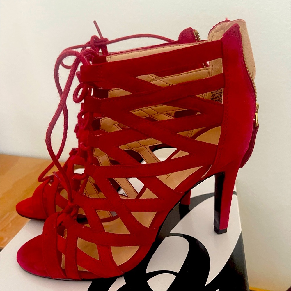 Never worn. Laced Heels